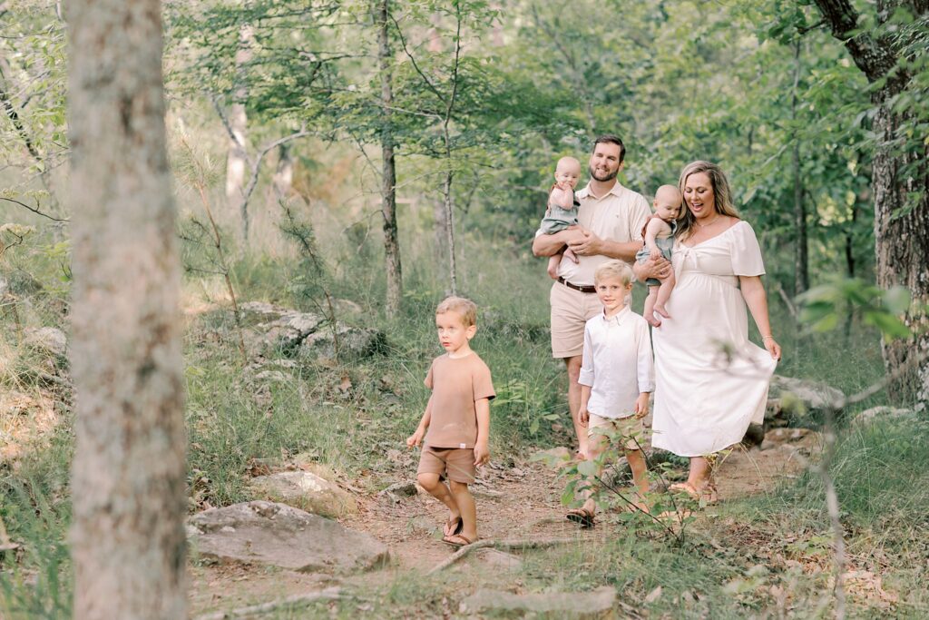 Family walking along wooded trail at Pigeon Hill Trailhead