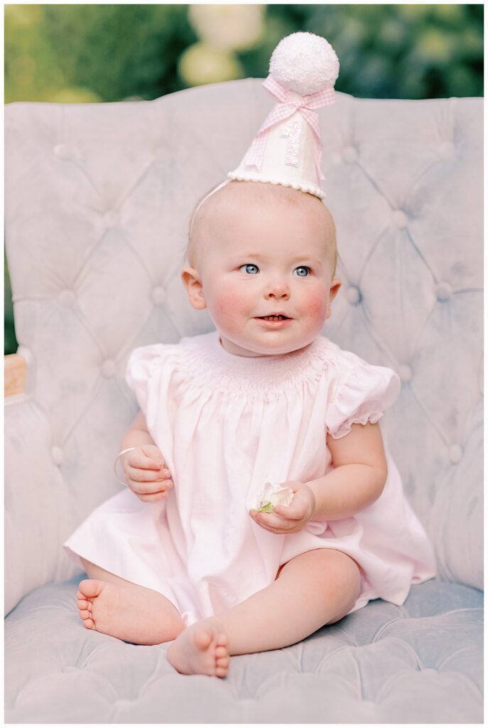 First birthday portrait of baby girl in hydrangea garden at McGarity House
