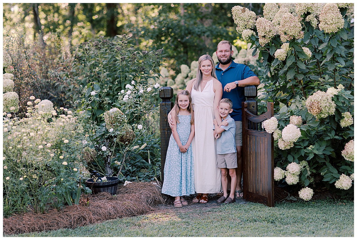 Extended family in coordinated soft neutral outfits at White Oak Park in Dallas, Georgia