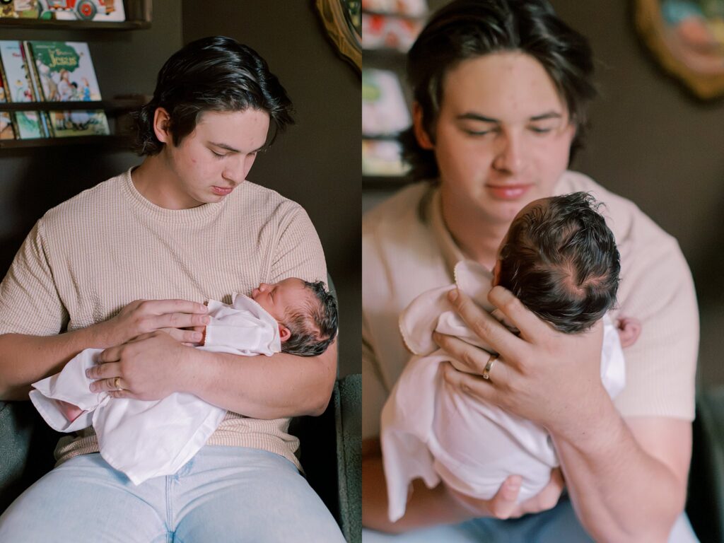 Grayson holding his newborn son Wells at home